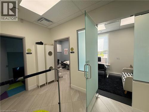 Frosted glass doors and a window provide privacy and natural light - 51 Benton Street, Kitchener, ON 