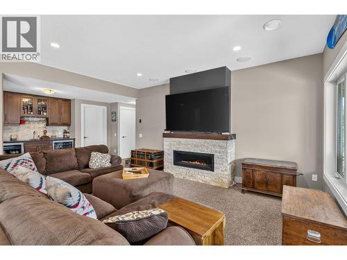 1084 Stockley Street, Kelowna, BC - Indoor Photo Showing Living Room With Fireplace