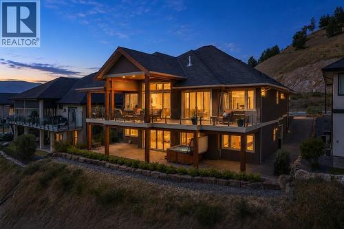 AI Twilight Generated - 1084 Stockley Street, Kelowna, BC - Outdoor With Deck Patio Veranda