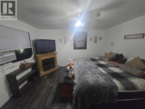 3231 Hayman Crescent, Quesnel, BC - Indoor Photo Showing Bedroom With Fireplace