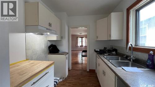 355 10Th Street E, Prince Albert, SK - Indoor Photo Showing Kitchen With Double Sink