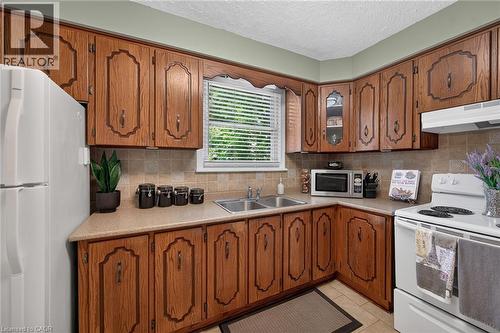 180 East 25Th Street, Hamilton, ON - Indoor Photo Showing Kitchen With Double Sink