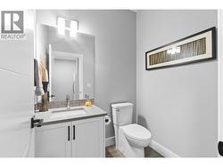 Well appointed main bathroom finished with contemporary fixtures and stylish design - 