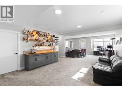 The thoughtfully designed lower level offers flexible living space that can easily function as a family room, recreation room, home theatre, or entertainment area. - 
