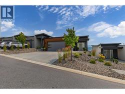 Welcome home to Okanagan Hills Boulevard, where luxury living meets breathtaking panoramic Okanagan Lake views. - 