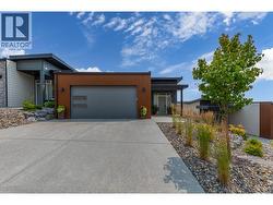 Spacious driveway providing ample parking for family and guests. - 