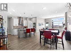 Bright and spacious open concept design featuring soaring ceilings and an abundance of natural light. - 