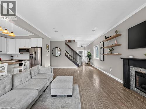 3 Hitching Post Ridge, Binbrook, ON - Indoor Photo Showing Living Room With Fireplace