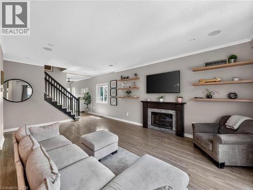 3 Hitching Post Ridge, Binbrook, ON - Indoor Photo Showing Living Room With Fireplace