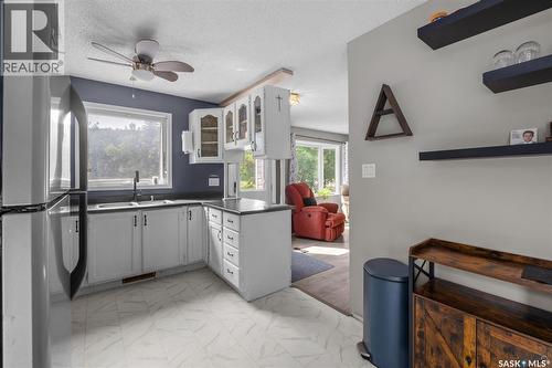 209 Macdowall Crescent, Prince Albert, SK - Indoor Photo Showing Kitchen With Double Sink