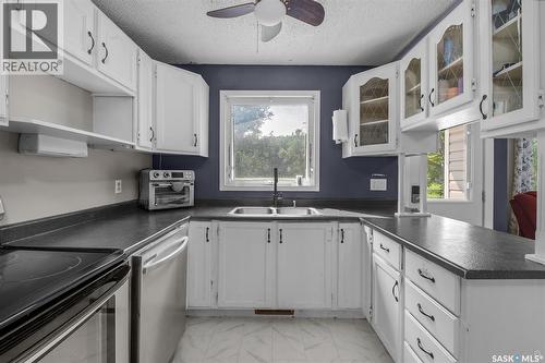 209 Macdowall Crescent, Prince Albert, SK - Indoor Photo Showing Kitchen With Double Sink