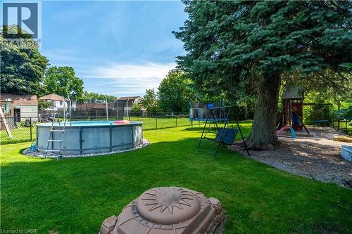 54 Selkirk Street, Caledonia, ON - Outdoor With Above Ground Pool With Backyard