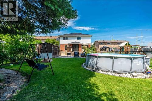 54 Selkirk Street, Caledonia, ON - Outdoor With Above Ground Pool With Backyard