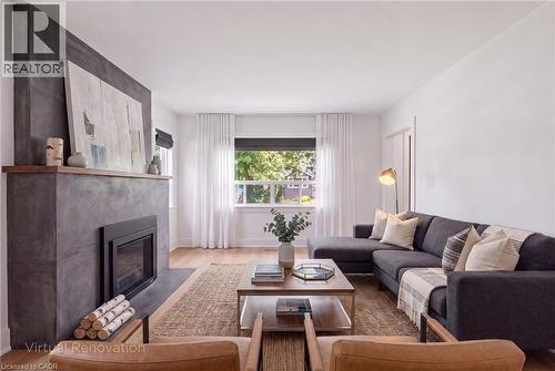 Virtually Renovated Living Room - 188 Troy Street, Mississauga, ON - Indoor Photo Showing Living Room With Fireplace