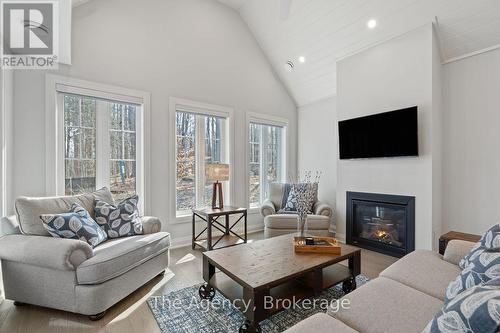 39 - 2054 Peninsula Road, Muskoka Lakes (Medora), ON - Indoor Photo Showing Living Room With Fireplace