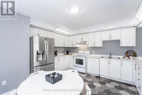 5 Harbour Crescent, Wasaga Beach, ON - Indoor Photo Showing Kitchen With Double Sink