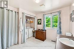 Main Bathroom with laundry - 