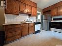 223 9Th Street, Weyburn, SK  - Indoor Photo Showing Kitchen With Double Sink 