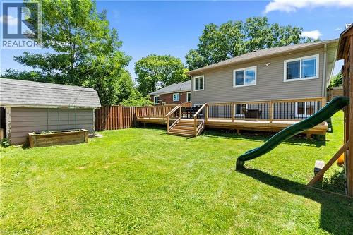 Expansive green lawn with a wood privacy fence - 258 Sanatorium Road, Hamilton, ON - Outdoor With Deck Patio Veranda With Exterior