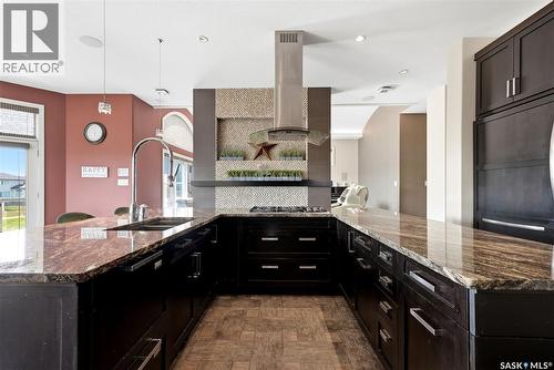 2423 Linner Bay, Regina, SK - Indoor Photo Showing Kitchen With Double Sink With Upgraded Kitchen