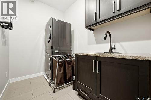 2423 Linner Bay, Regina, SK - Indoor Photo Showing Laundry Room