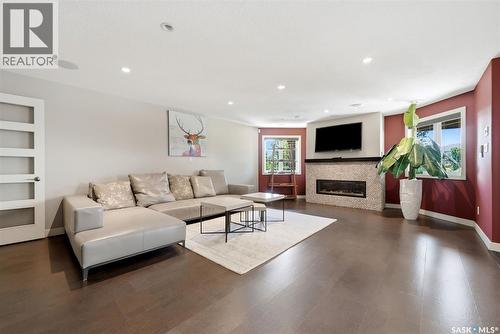 2423 Linner Bay, Regina, SK - Indoor Photo Showing Living Room With Fireplace