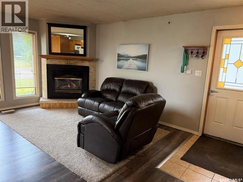 202 1St Street E, Turtleford, SK - Indoor Photo Showing Living Room With Fireplace