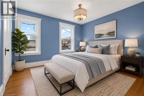 This image has been virtually staged - 520 John Street N, Hamilton, ON - Indoor Photo Showing Bedroom