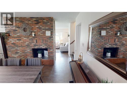 115 S Brears Road, Quesnel, BC - Indoor Photo Showing Living Room With Fireplace