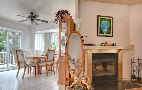Vue d'ensemble - 92 Rue Du Guéret, L'Épiphanie, QC - Indoor Photo Showing Dining Room With Fireplace