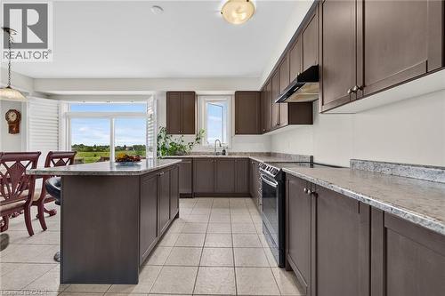 76 Mcwatters Street, Binbrook, ON - Indoor Photo Showing Kitchen With Double Sink