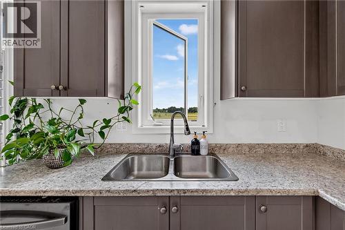 76 Mcwatters Street, Binbrook, ON - Indoor Photo Showing Kitchen With Double Sink