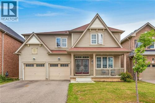 76 Mcwatters Street, Binbrook, ON - Outdoor With Deck Patio Veranda With Facade