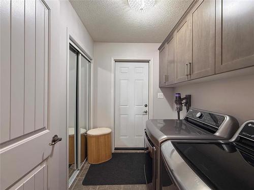 55 Outback Drive, Brandon, MB - Indoor Photo Showing Laundry Room