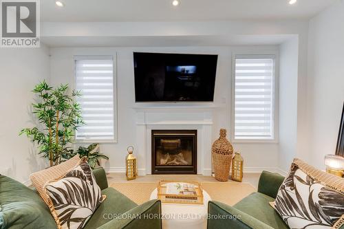 15 Mountainside Crescent, Whitby, ON - Indoor Photo Showing Living Room With Fireplace