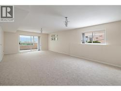 downstairs family room with great natural light! - 