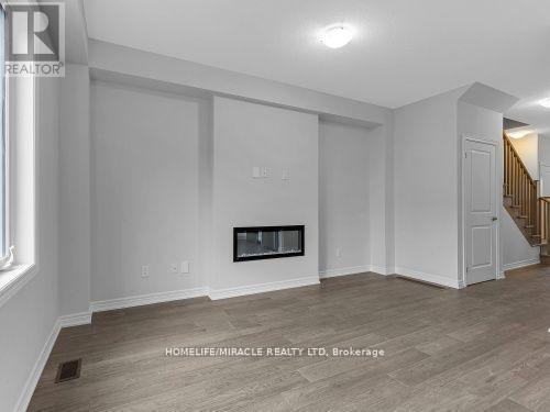 32 Vickers Road, Hamilton, ON - Indoor With Fireplace