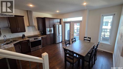 204 3229 Elgaard Drive, Regina, SK - Indoor Photo Showing Kitchen With Stainless Steel Kitchen With Double Sink