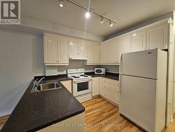 203 - 648A YONGE STREET Toronto, ON M4Y 2A6
