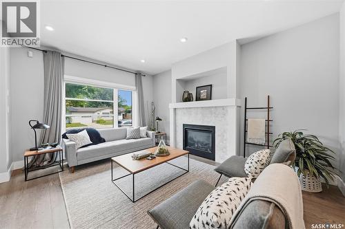 1513 Prince Of Wales Avenue, Saskatoon, SK - Indoor Photo Showing Living Room With Fireplace