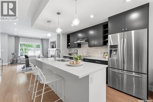1513 Prince Of Wales Avenue, Saskatoon, SK - Indoor Photo Showing Kitchen With Double Sink With Upgraded Kitchen