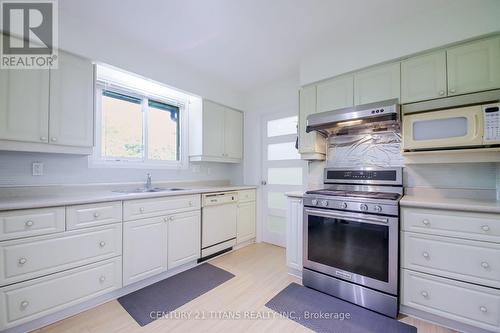 9 Minos Crescent, Toronto, ON - Indoor Photo Showing Kitchen With Double Sink