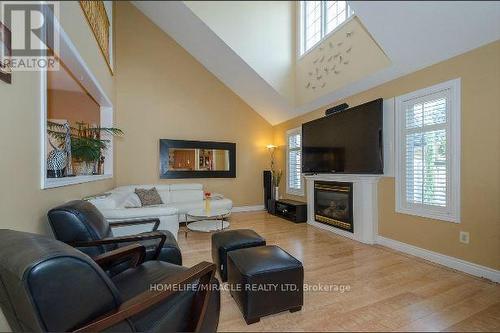 30 Masters Green Crescent, Brampton, ON - Indoor Photo Showing Living Room With Fireplace
