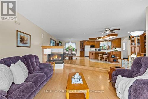 3805 Big Rideau Lake Road, Rideau Lakes, ON - Indoor Photo Showing Living Room With Fireplace