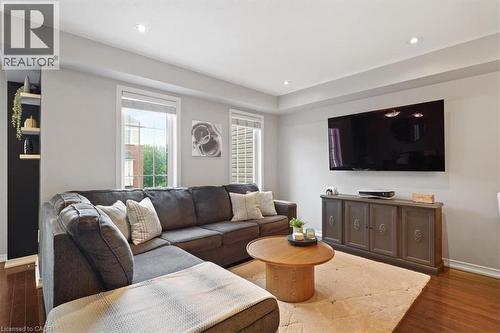 Open concept living space featuring recessed lighting and rich wood-finish flooring - 7 Sirente Drive Unit# 7, Hamilton, ON - Indoor Photo Showing Living Room