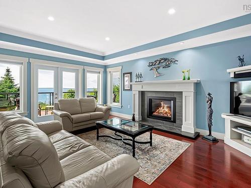 116 Whitecap Ridge, Black Point, NS - Indoor Photo Showing Living Room With Fireplace