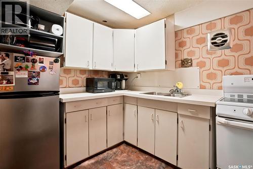 7343 8Th Avenue, Regina, SK - Indoor Photo Showing Kitchen With Double Sink