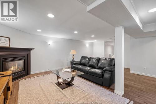 946 Belleperche, Windsor, ON - Indoor Photo Showing Living Room With Fireplace