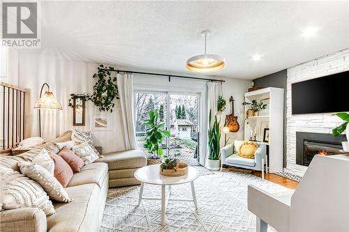 2016 Latimer Crescent, Sudbury, ON - Indoor Photo Showing Living Room With Fireplace