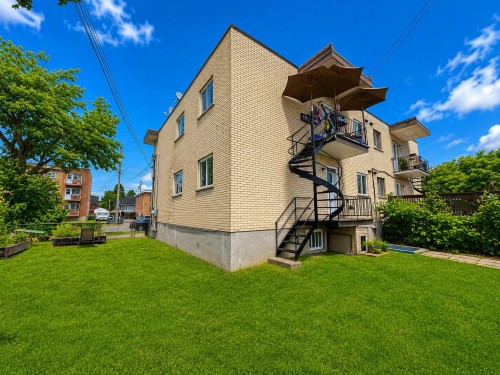 Back of Structure - 61-61 Rue Ste-Anne, Montréal (L'Île-Bizard/Sainte-Geneviève), QC - Outdoor